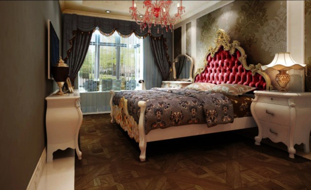 Фото: массивная кровать с резными ножками и изголовьем в спальне классического стиля
